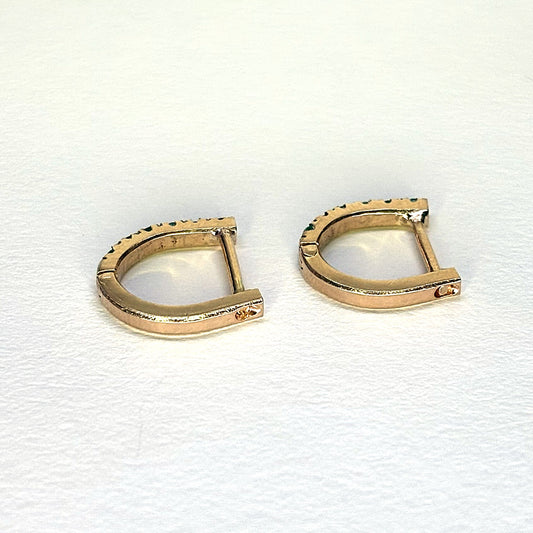 Aretes de oro de 18 quilates con 6 esmeraldas cada uno