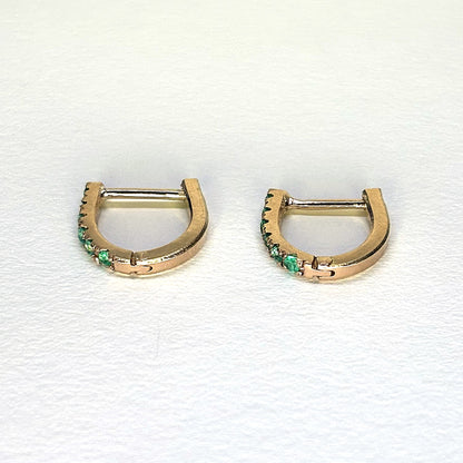 Aretes de oro de 18 quilates con 6 esmeraldas cada uno