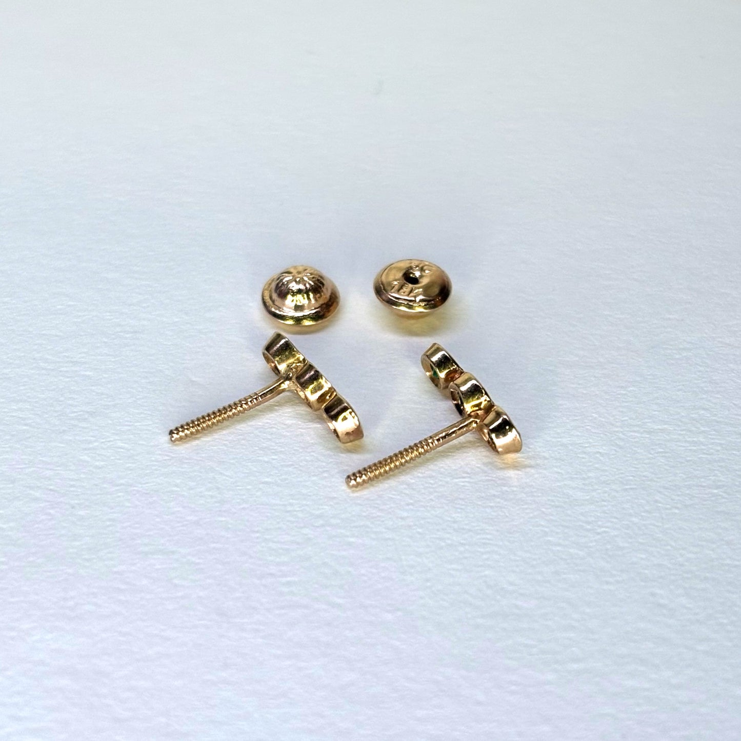 Aretes de oro de 18K con 3 esmeraldas  naturales