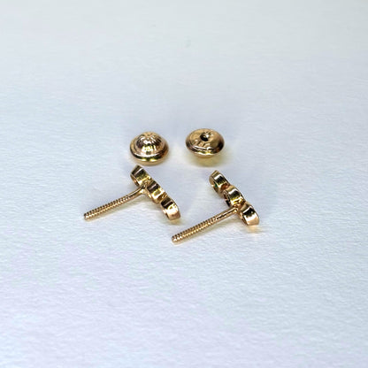 Aretes de oro de 18K con 3 esmeraldas  naturales